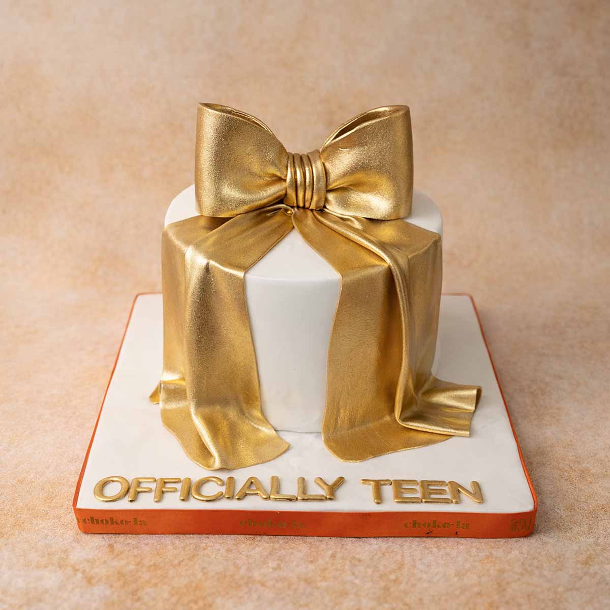 Golden Bow Celebration Cake